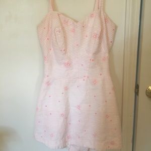 Floral mini baby pink dress with shorts under.